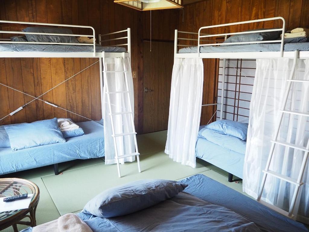 Guesthouse ＆ Beach Cafe Fuego Hyuga Номер фото