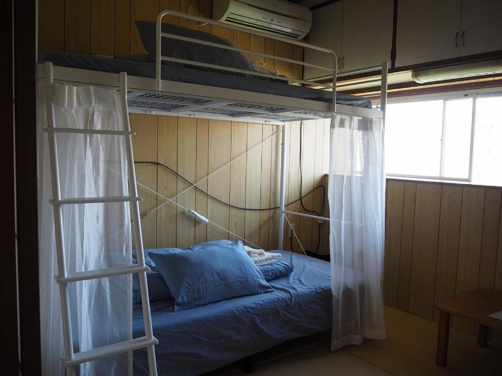 Guesthouse ＆ Beach Cafe Fuego Hyuga Номер фото